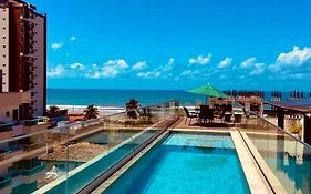 Apt 2 quartos com Vista Mar Piscina e Varanda 200 m da Praia Ilheus BA